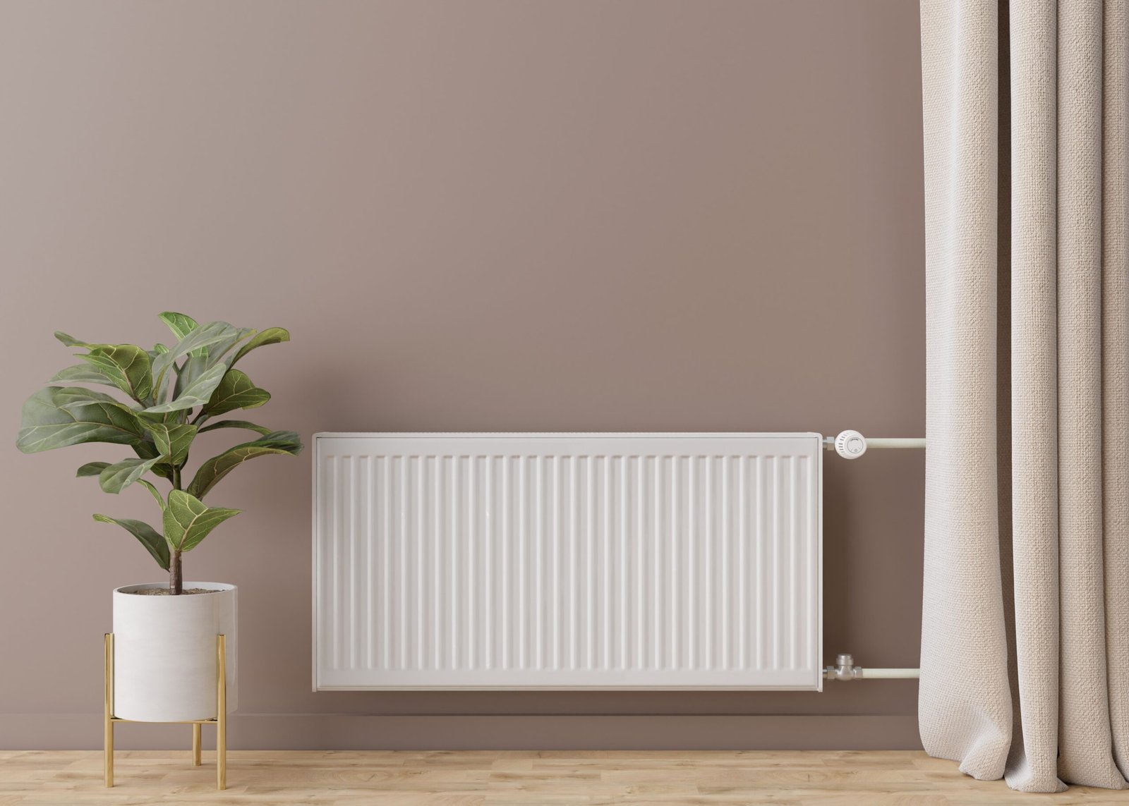 image illustrant un radiateur à eau de chauffage central en acier blanc équipé d'un robinet thermostatique